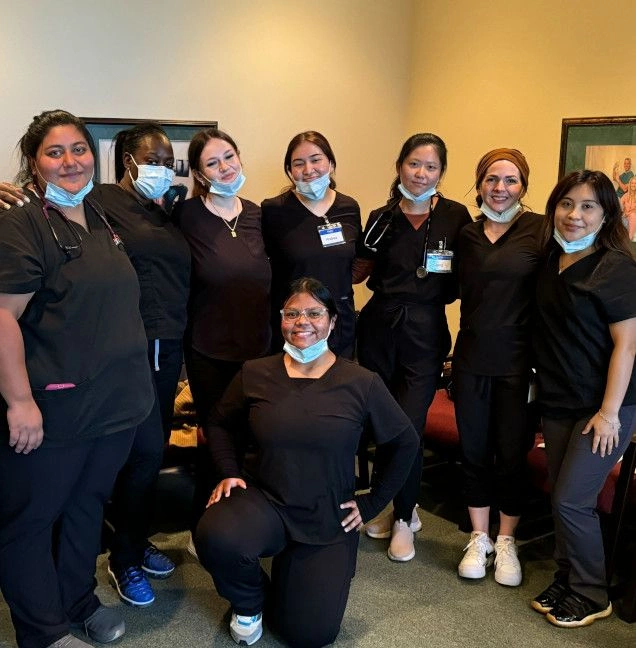 {{ school.name }} students posing in group photo {{ school.name }} students posing in group photo